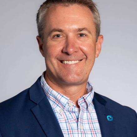 Brian Gladysz, senior director of global business management headshot.